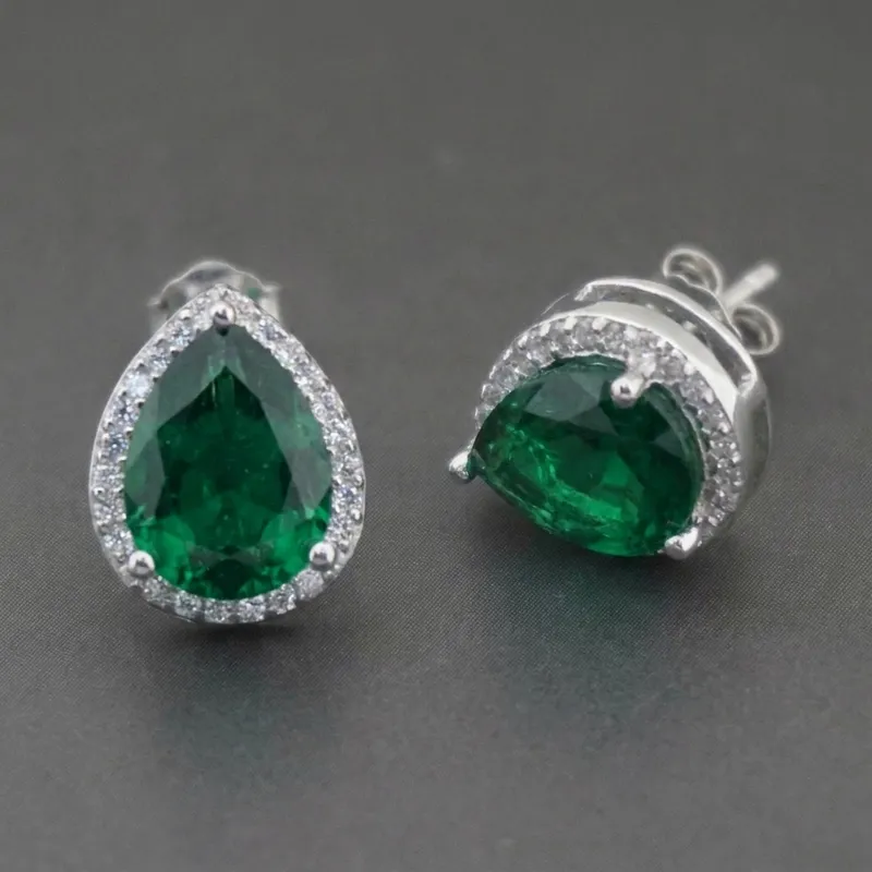 Brincos ME-121BR: gotas de esmeralda com halo de zircônias em prata 925